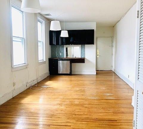 Living room facing kitchen