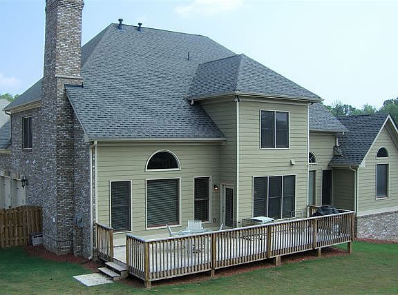 Large deck and private back yard