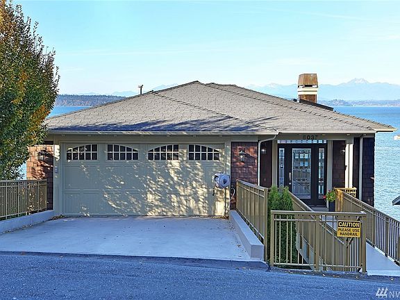 Front view of the home with attached 2 car garage.