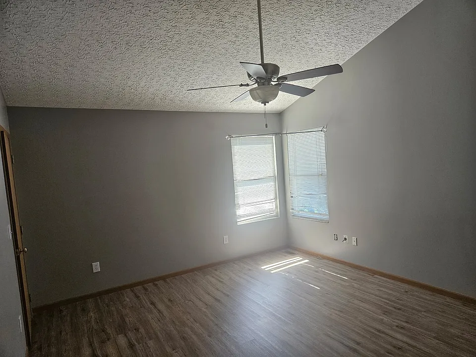 Master Bedroom - Full bathroom, walk in closet, second closet with storage. New floors.