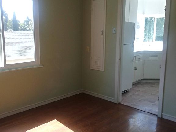 dining room with built-in ironing board