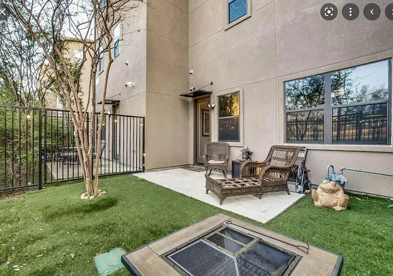 Private pet friendly Backyard with turf.