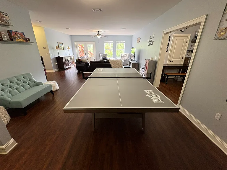 Terrace Level Expansive Family Room, game room, and adjacent bonus room (office/workout room).