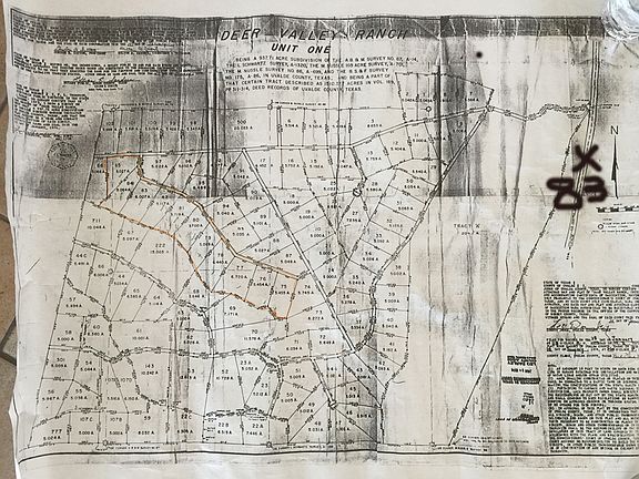 Land is outlined in orange  