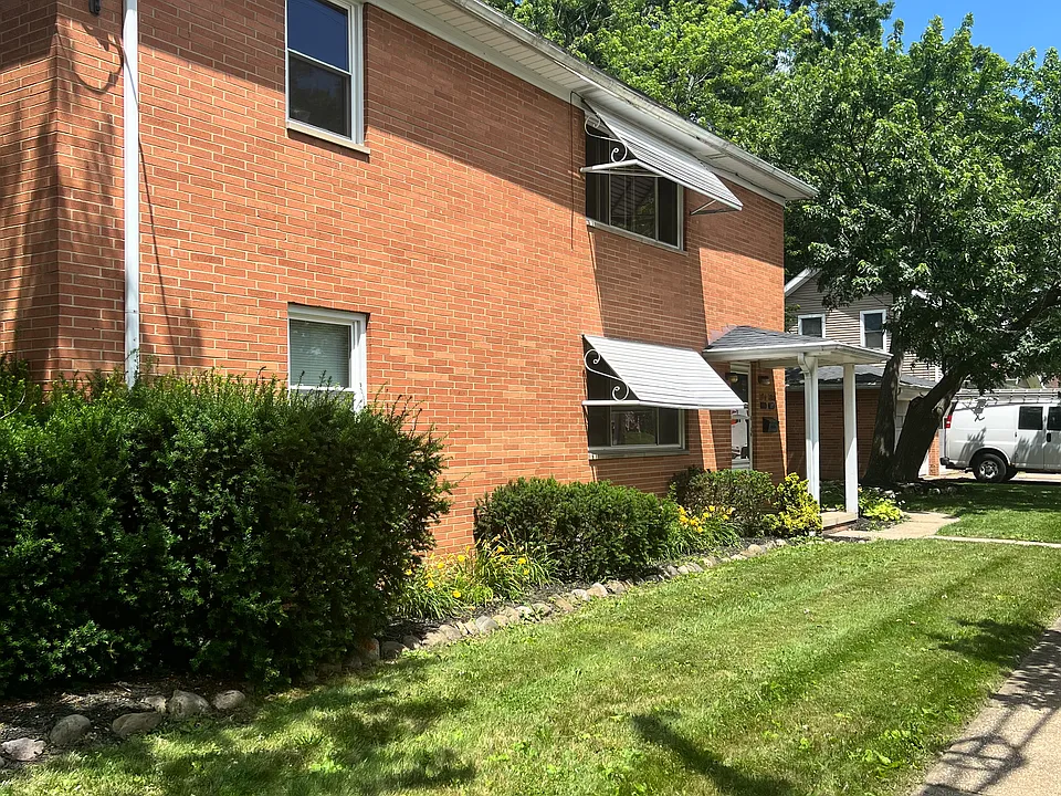 Building. Unit for rent is ranch-style, upstairs