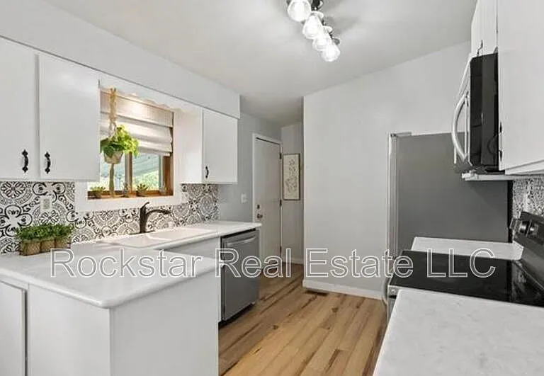 11217 E 11th Ave — Photo 22