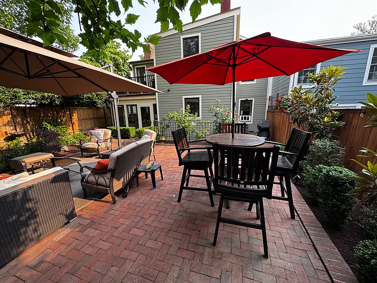 Backyard, grill by house on left side.
