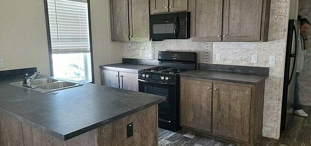 1st image of 1703 W 3rd Ave