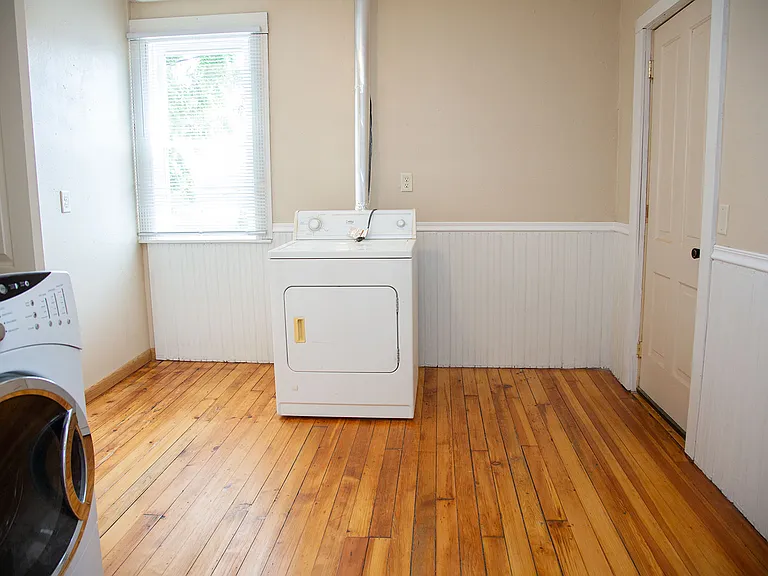 2nd floor laundry. Bathroom to the left, sun porch to the right