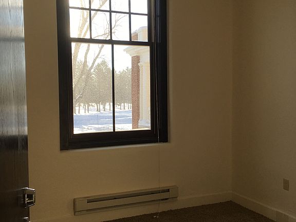 Large windows with shades
