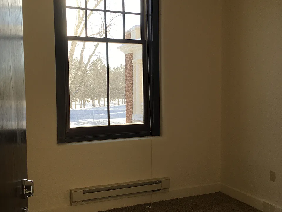 Large windows with shades