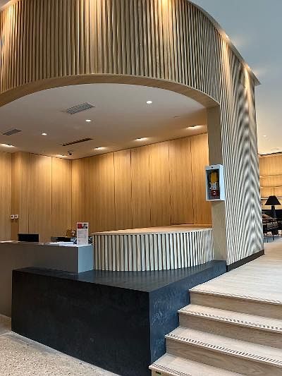 -Reception with concierge for safety and mail/parcel delivery services. 
-Up the stairs is a shared working space.