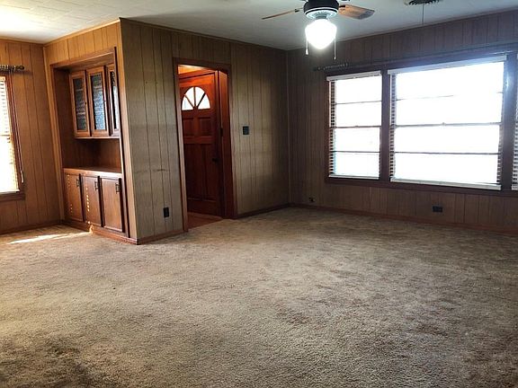 Large living room with attached dining room.