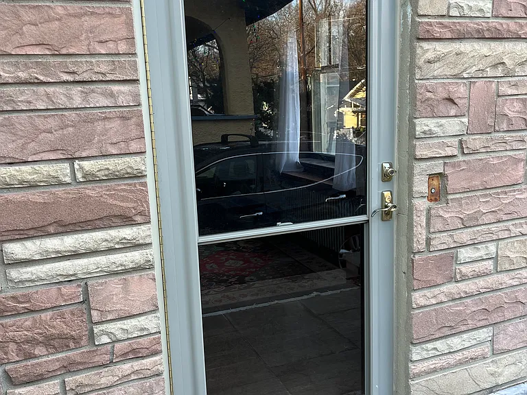 Your front door, glass pane lowers to let in the breeze if desired.