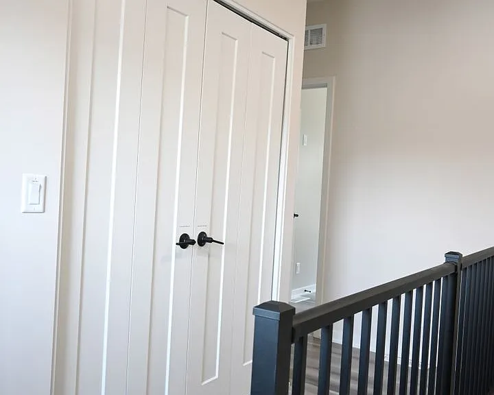 Third floor landing area next to washer and dryer closet.