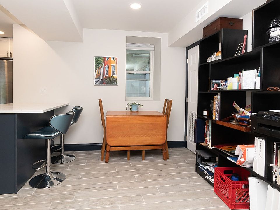 Dining area next to island with counter seating