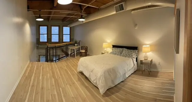 Upstairs loft with office area, large walk in closet and full bath with laundry area.