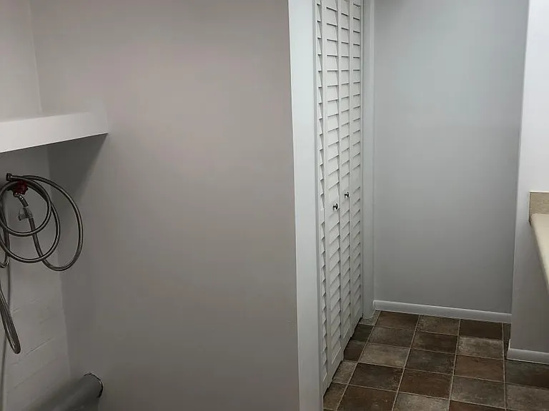 6 ft built in clothes folding table (right).
