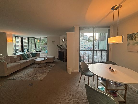 Living Room and Dining Room with balcony off the dining room