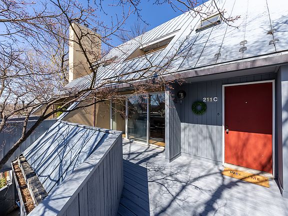 Exterior view featuring lower-level balcony off great room