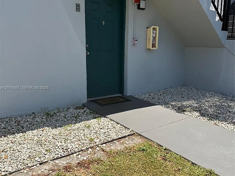 7120 NW 179th St #105 — Photo 1