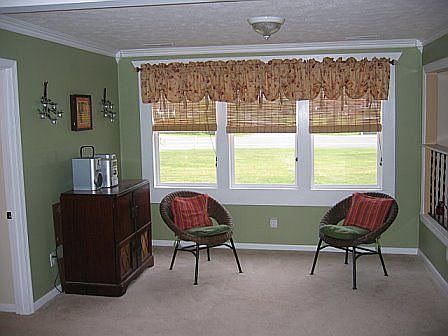 room just off the kitchen, sliding glass door on to patio on oposite site