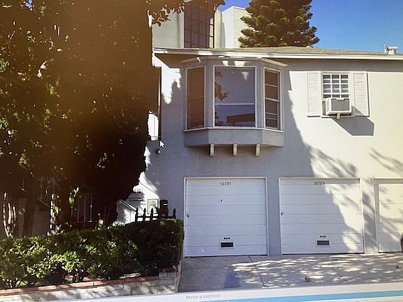 Private upper unit with parking and garage