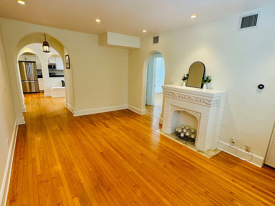 Beautiful wood floors & recessed lighting through out the unit.
