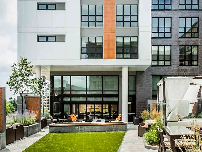 Elevated Sundeck with Lawn Area and Cabanas
