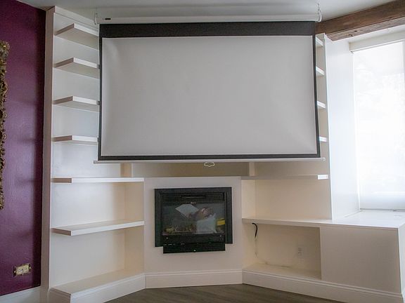 Oversized retractable movie screen for a premium viewing experience.
