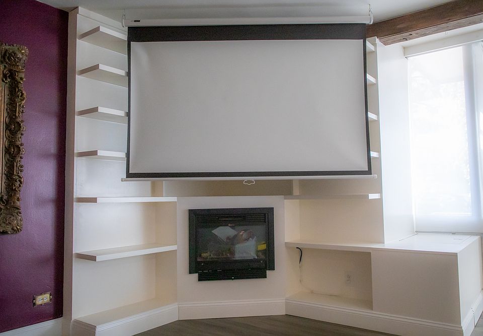 Oversized retractable movie screen for a premium viewing experience.