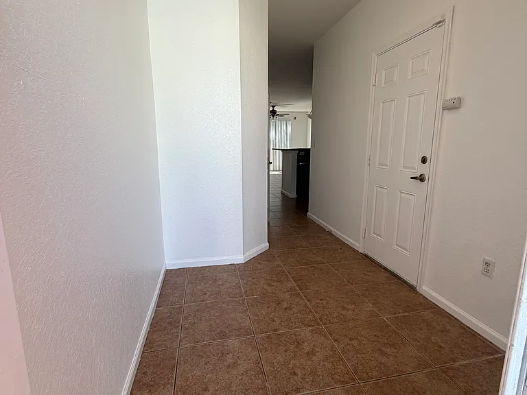 Entryway, garage door on the right.