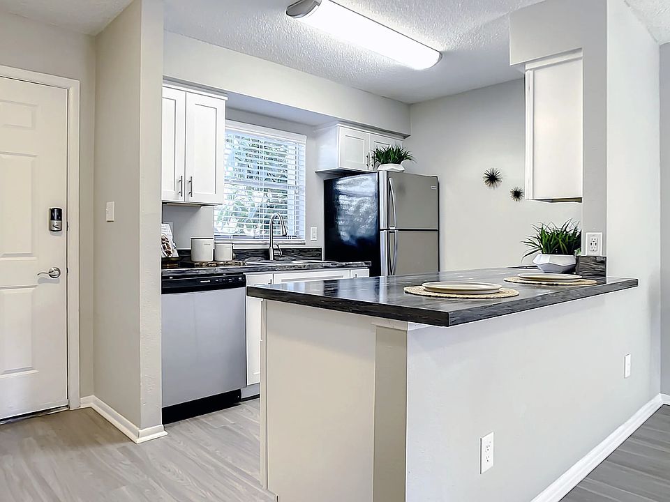 Select floor plans feature kitchens with spacious, open breakfast bars - a host's dream for gatherings and good times.