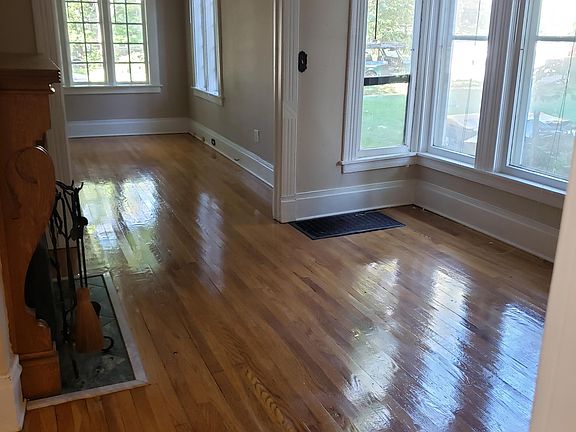 dining room looking towards front living room. Tons of natural light in this apartment!