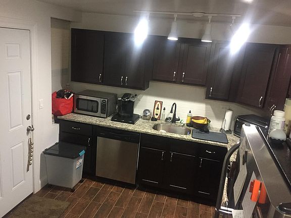 kitchen, door leads to back alley