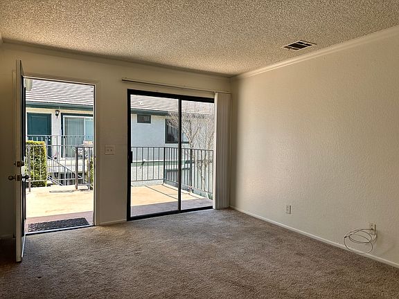 Large living room with plenty of light.