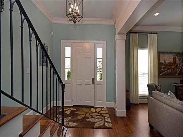 Welcome Home! Nuvo Sound System and Majestic Walnut Floors throughout the home! The home also offers an elevator shaft on all three floors!