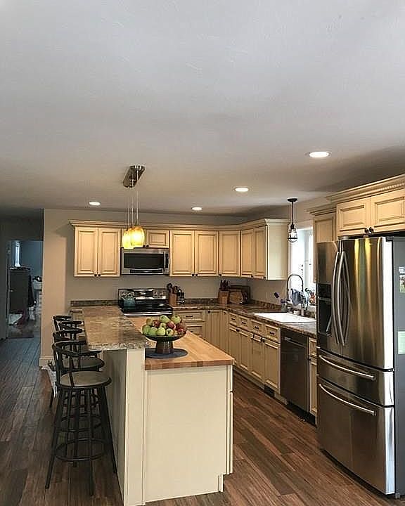 Kitchen has seating for four