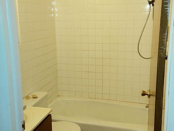 Full bath is at the top of the steps just outside both bedroom doors.