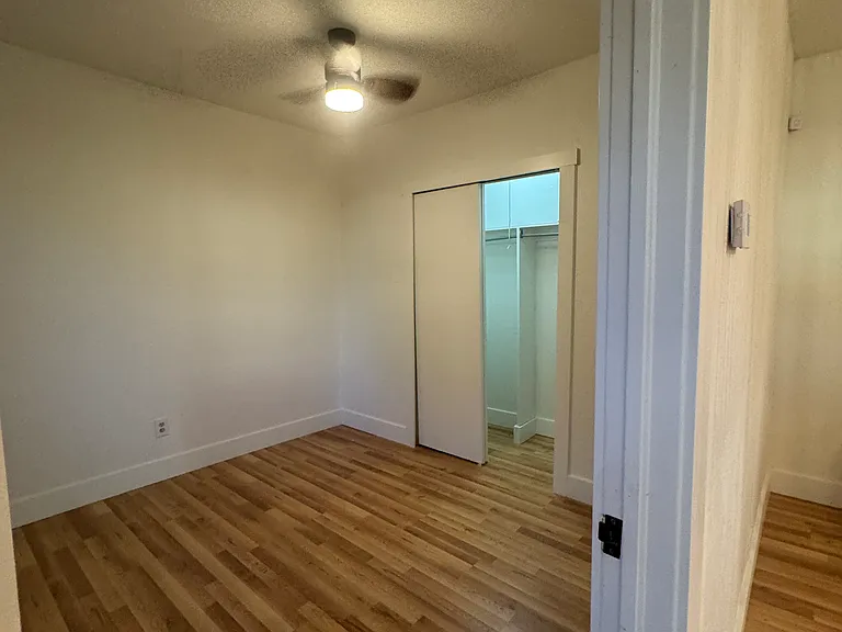 View into the large bedroom with a large closet (hard to find in Mesta Park)