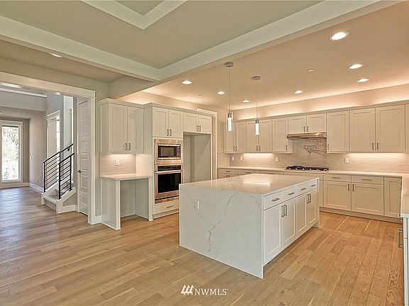 Photos are of another home in the community and are for illustration purposes only to reflect typical finishes.  May depict seller enhancements. Colors and options may vary.