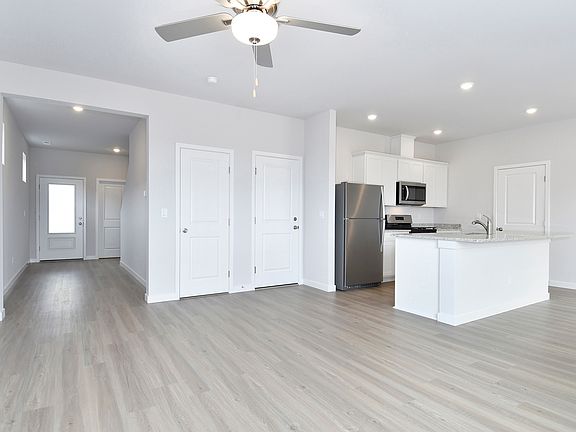 The family room is spacious and open to the kitchen.