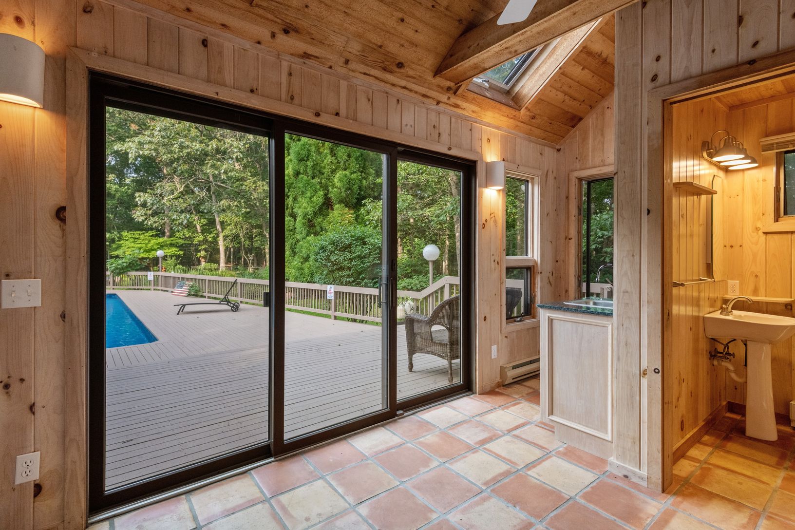  Inside pool house with full bath