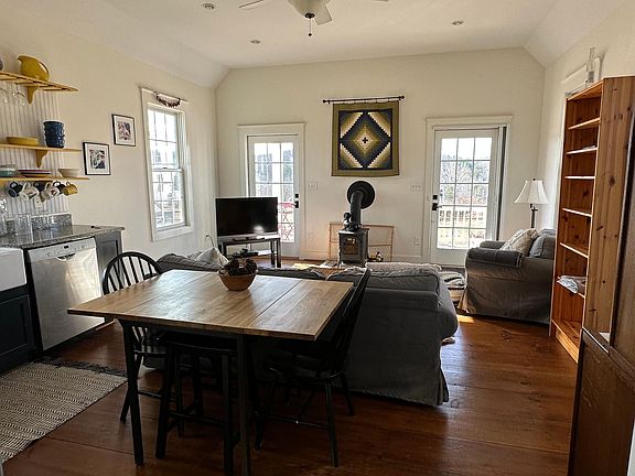 kitchen view of living area and deck.