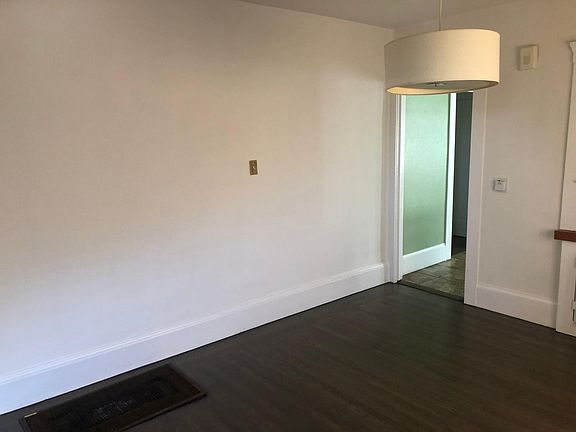 Door to kitchen from dining room.
