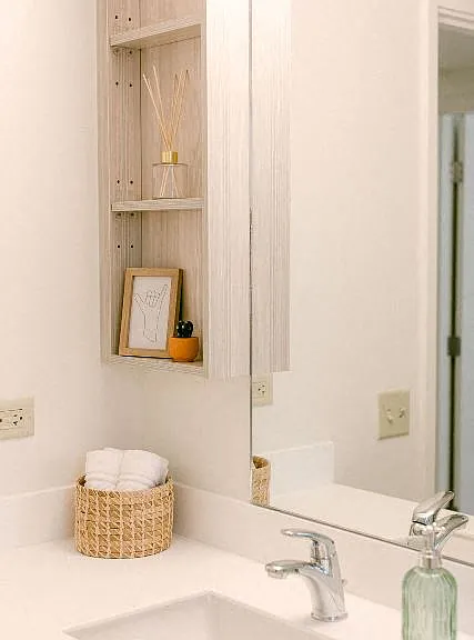Kanekapolei Collection Bathroom Vanity, sink, and mirror with decor
