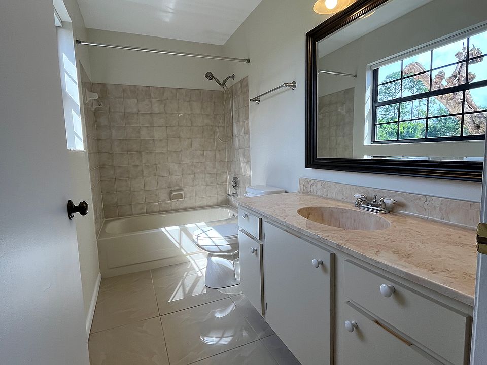 Bathroom includes window and full bath & shower
