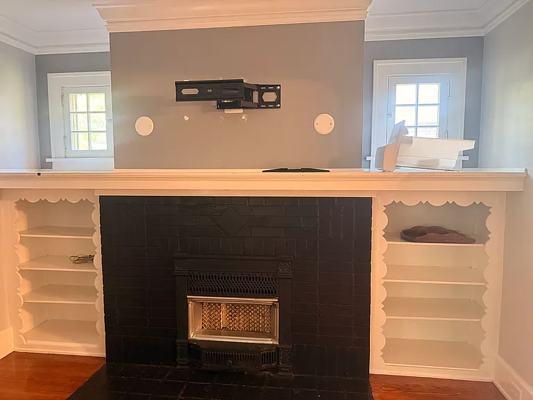 Living room fireplace and TV area