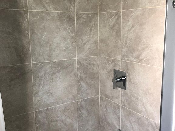 Newly remodeled bathroom! Brand new tiling and fixtures