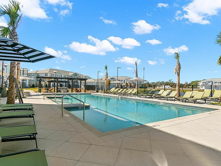 Swimming Pool and Poolside Cabanas w/ Lounge Seating